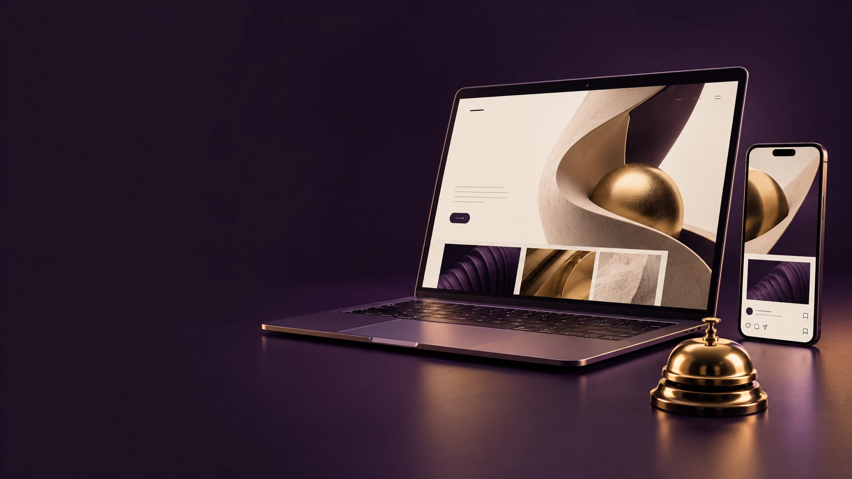 A laptop and a phone showing an elegant website, next to a golden service bell